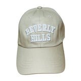 Beige cap with white letters beverly hills